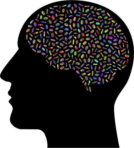 Cerveau avec des pilules colorées