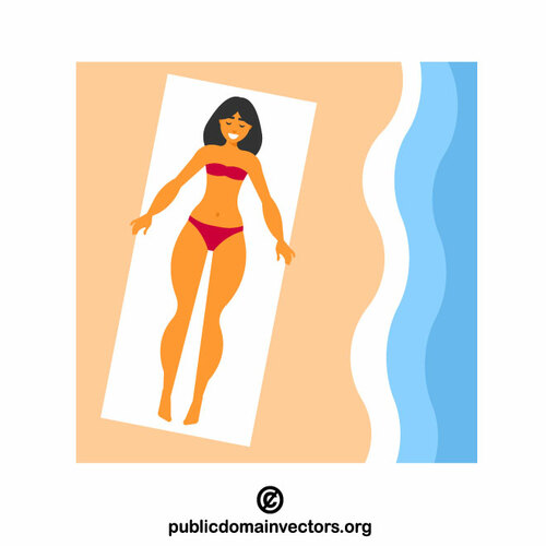 Kvinna som solar på stranden