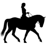 Nainen ratsastamassa hevosella siluetti
