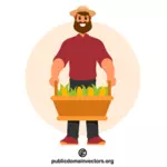 Agricultor segura cesta com milho