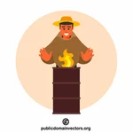 Mann an einem brennenden Fass