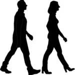 Mann og kvinne som spaserer silhuett