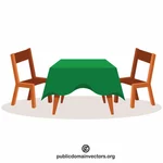 طاولة مع مفرش المائدة الأخضر